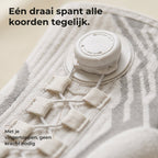 Close-up van de draaiknop: één draai spant alle koorden tegelijk, met je vingertoppen