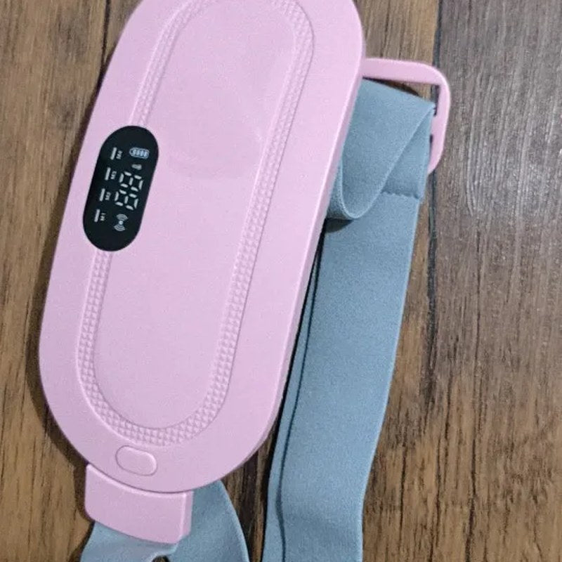 Klantfoto: roze warmteband met grijze band op een houten tafel